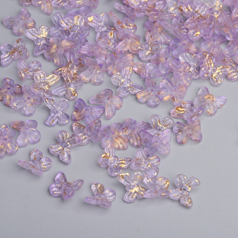 Purple butterfly-shaped craft beads with gold accents for creative Hairpin Materials projects